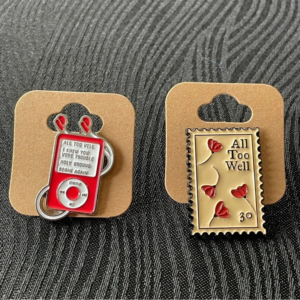 Two Enamel Pins Celebrating Taylor Swift’s 2012 Album Red - All Too Well & IPod